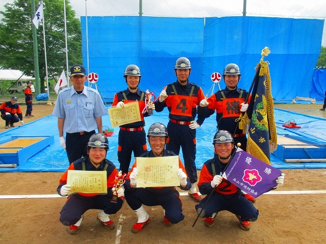 岐阜県消防操法大会予選の部で優勝した清見支団三日町班の写真