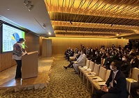 写真：田中市長の発表に耳を傾ける聴講者