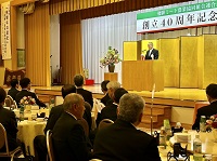 写真：式典であいさつをする志田浩一飛騨ミート農業協同組合連合会代表理事会長