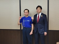 写真（左側）：全国大会に出場される田中昌幸さん