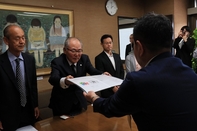 校章決定報告会の様子